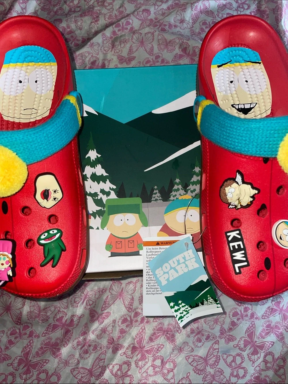 CROCS Red Slip-On Clogs with Teal Strap and Yellow Pom-Poms